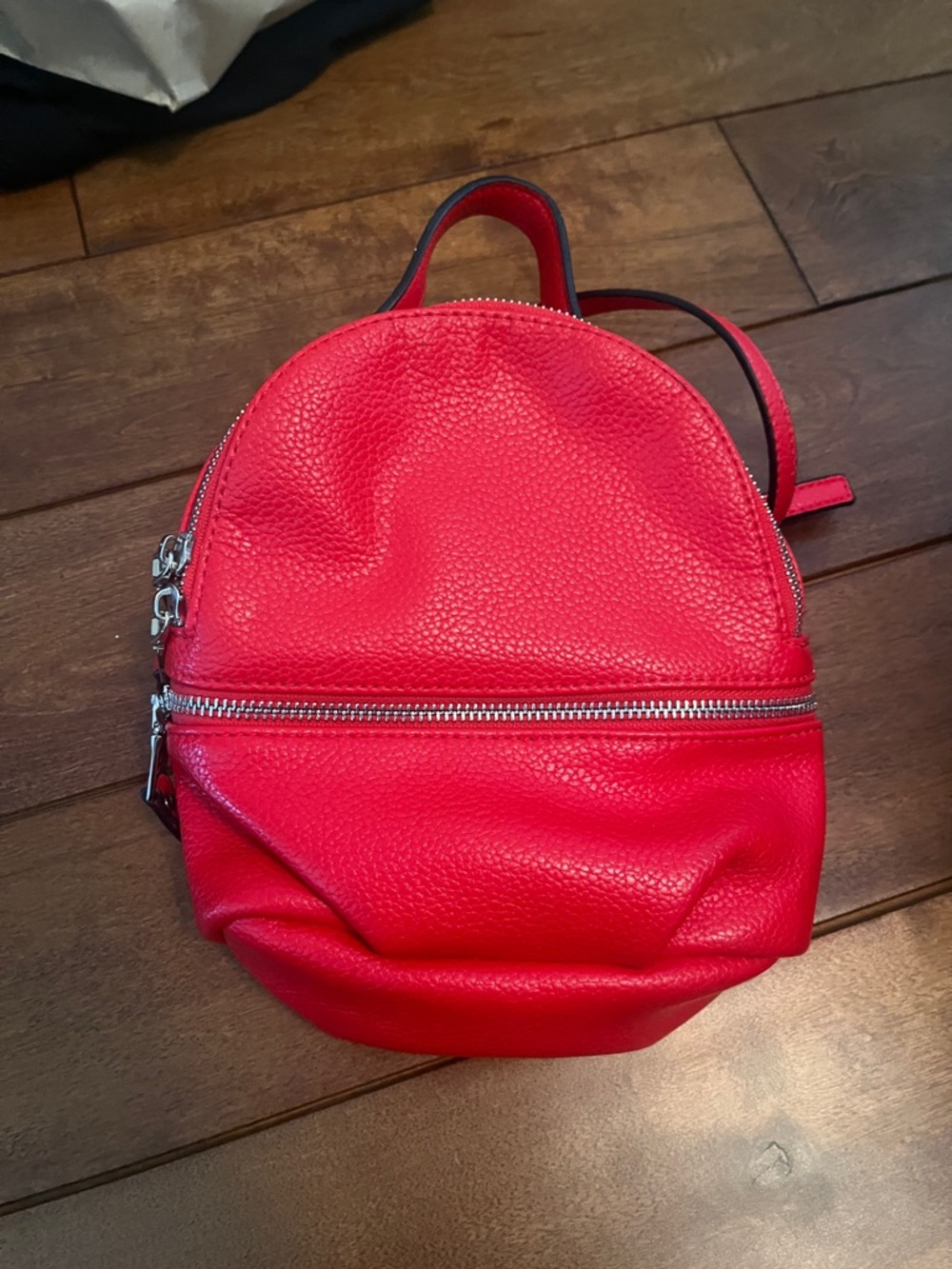 Red Steve Madden mini backpack